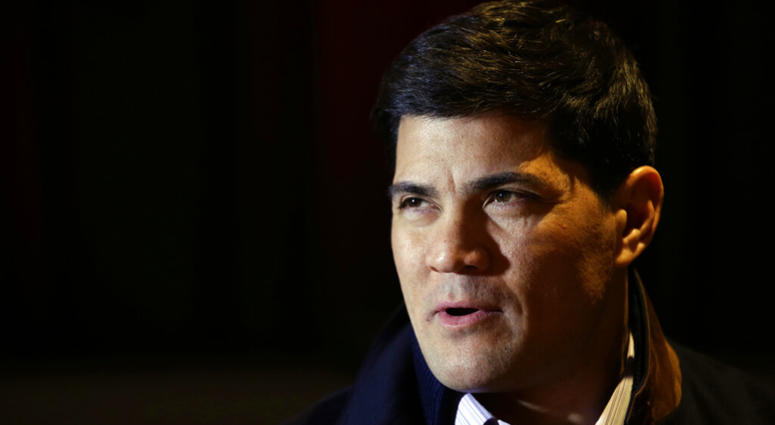 In this Jan. 29, 2014, file photo, Tedy Bruschi speaks during an interview at the NFL Super Bowl XLVIII media center in New York. AP DO NOT USE