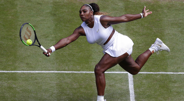 United States' Serena Williams returns to Czech Republic's Barbora Strycova during a women's singles semifinal match on day ten of the Wimbledon Tennis Championships in London, Thursday, July 11, 2019 AP DO NOT USE