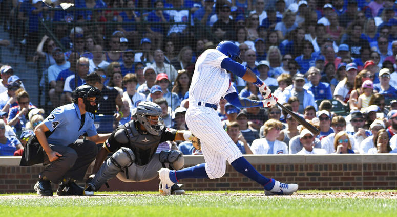 Chicago Cubs' Jason Heyward (22) hits a two-run home run against the Pittsburgh Pirates during the fifth inning of a baseball game, Sunday, July, 14, 2019, in Chicago. Chicago Cubs' Jason Heyward (22) hits a two-run home run against the Pittsburgh Pirates during the fifth inning of a baseball game, Sunday, July, 14, 2019, in Chicago.