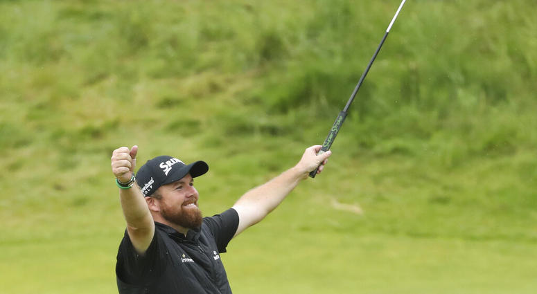 Ireland's Shane Lowry lifts his club to celebrate as he wins the British Open Golf Championships at Royal Portrush in Northern Ireland, Sunday, July 21, 2019. Ireland's Shane Lowry lifts his club to celebrate as he wins the British Open Golf Championships at Royal Portrush in Northern Ireland, Sunday, July 21, 2019.