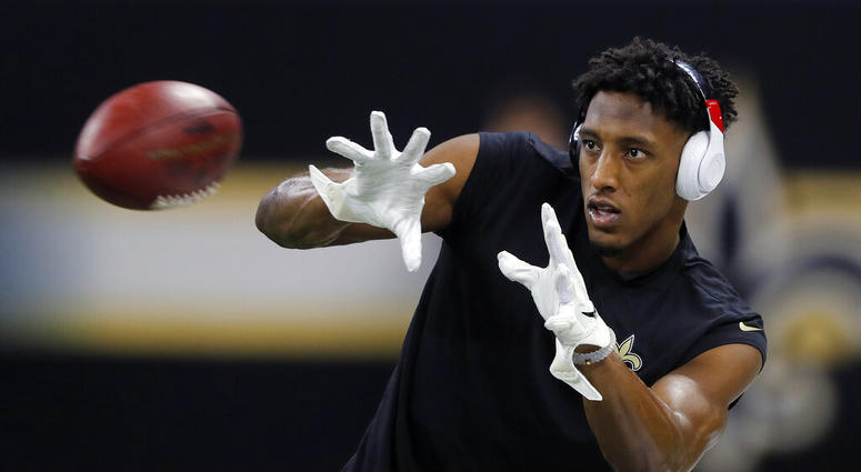 In this Sunday, Jan. 20, 2019 file photo, New Orleans Saints' Michael Thomas warms up before the NFL football NFC championship game against the Los Angeles Rams