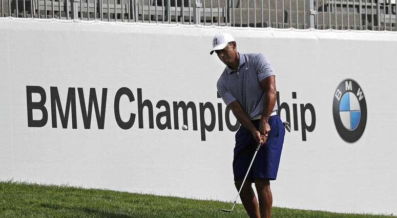 Tiger Woods chips an approach shot on the 12th hole during the pro-am round of the BMW Championship golf tournament at Medinah Country Club, Wednesday, Aug. 14, 2019, in Medinah, Ill. Tiger Woods chips an approach shot on the 12th hole during the pro-am round of the BMW Championship golf tournament at Medinah Country Club, Wednesday, Aug. 14, 2019, in Medinah, Ill.