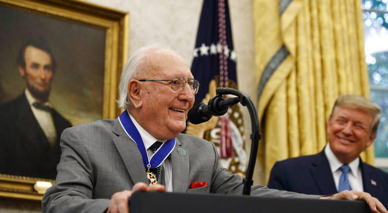 Former NBA basketball player and coach Bob Cousy, of the Boston Celtics, speaks as President Donald Trump smiles during a Presidential Medal of Freedom ceremony for Cousy, in the Oval Office of the White House, Thursday, Aug. 22, 2019, in Washington. Former NBA basketball player and coach Bob Cousy, of the Boston Celtics, speaks as President Donald Trump smiles during a Presidential Medal of Freedom ceremony for Cousy, in the Oval Office of the White House, Thursday, Aug. 22, 2019, in Washington.