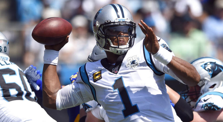 Carolina Panthers quarterback Cam Newton (1) looks to pass against the Los Angeles Rams during the first half an NFL football game in Charlotte, N.C., Sunday, Sept. 8, 2019. AP DO NOT USE