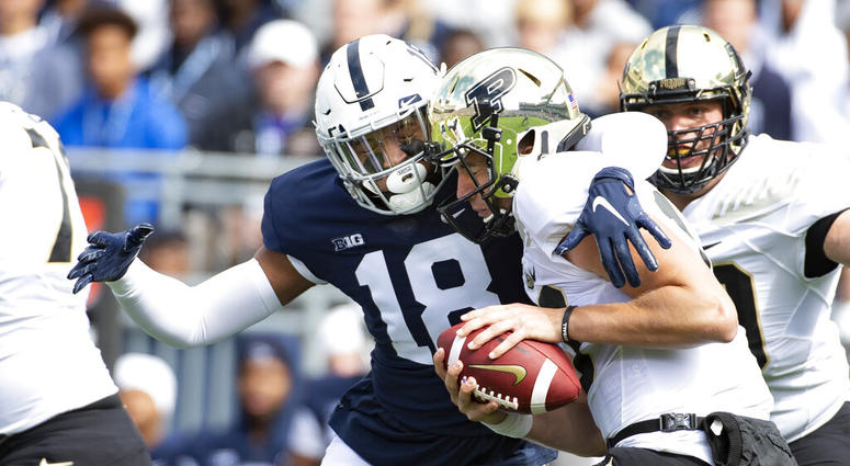 Penn State defensive end Shaka Toney (18) sacks Purdue quarterback Jack Plummer (13) in the first quarter of an NCAA college football game in State College, Pa., on Saturday, Oct. 5, 2019. Penn State defensive end Shaka Toney (18) sacks Purdue quarterback Jack Plummer (13) in the first quarter of an NCAA college football game in State College, Pa., on Saturday, Oct. 5, 2019.