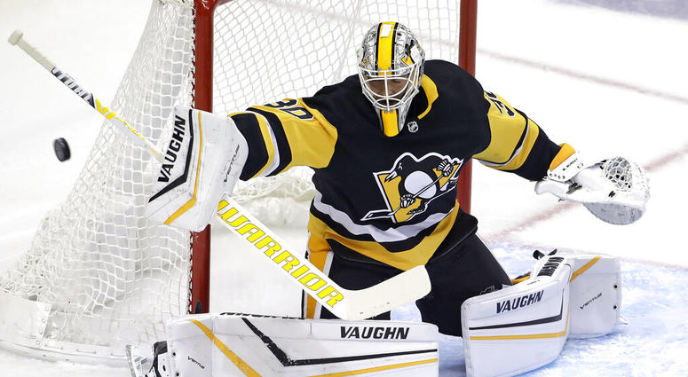 Pittsburgh Penguins goaltender Matt Murray blocks a shot during the first period of an NHL hockey game against the Winnipeg Jets in Pittsburgh, Tuesday, Oct. 8, 2019. Pittsburgh Penguins goaltender Matt Murray blocks a shot during the first period of an NHL hockey game against the Winnipeg Jets in Pittsburgh, Tuesday, Oct. 8, 2019.