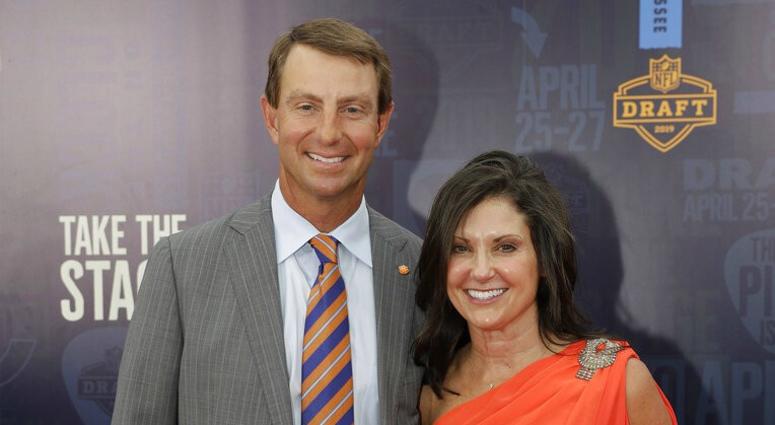 Clemson head coach Dabo Swinney and his wife Kathleen Bassett, walk the red carpet ahead of the first round at the NFL football draft, Thursday, April 25, 2019, in Nashville, Tenn ap do not use