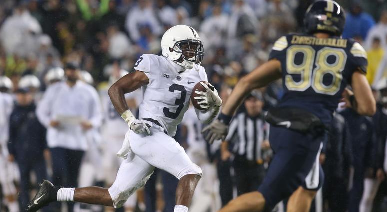 Penn State Nittany Lions wide receiver DeAndre Thompkins (3) runs on his way to scoring a touchdown on a punt return past Pittsburgh Panthers punter Kirk Christodoulou during the third quarter at Heinz Field