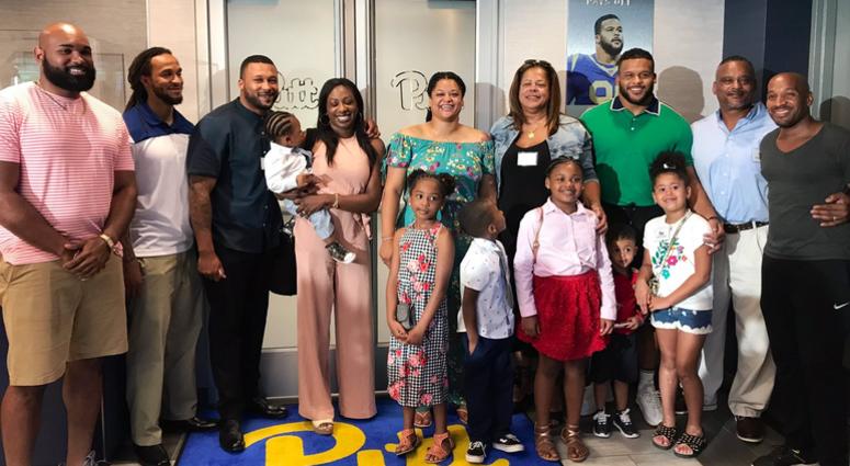 LA Rams defensive end Aaron Donald (green) at dedication of Aaron Donald Football Performance Center in June 2019