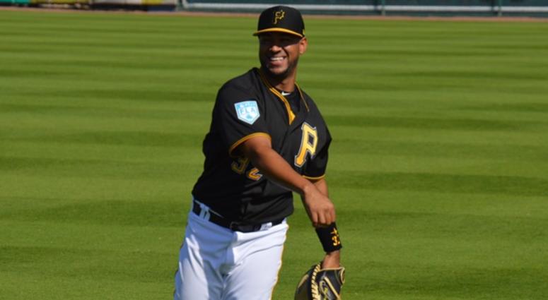 Elias Diaz throwing