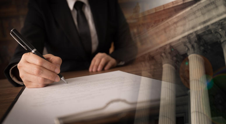 lawyer or attorney signing legal document and agreement with court background. legislation law legal concept lawyer or attorney signing legal document and agreement with court background. legislation law legal concept