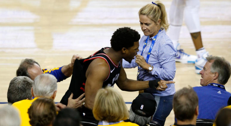 Kyle Lowry #7 of the Toronto Raptors yells at a fan in the second half against the Golden State Warriors during Game Three
