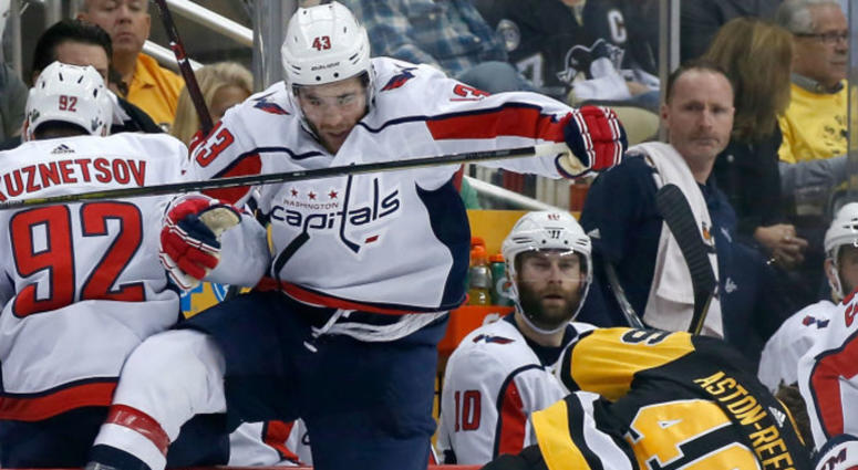 om Wilson #43 of the Washington Capitals collides with Zach Aston-Reese #46 of the Pittsburgh Penguins during the second period in Game Three of the Eastern Conference Second Round during the 2018 NHL Stanley Cup Playoffs DO NOT USE THIS IMAGE