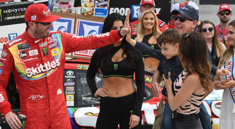 Kyle Busch High-Fives Son Brexton In Victory Lane At Bristol After Winning Kyle Busch In Victory Lane After Winning The Monster Energy NASCAR Cup Series Race At Bristol Motor Speedway