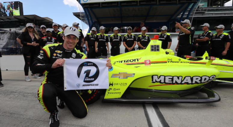 Team Penske's Simon Pagenaud Holds Up The NTT P1 Award After Winning The Pole Position For The 103rd Indianapolis 500 Team Penske's Simon Pagenaud Celebrates Winning The 103rd Indianapolis 500 Pole Position