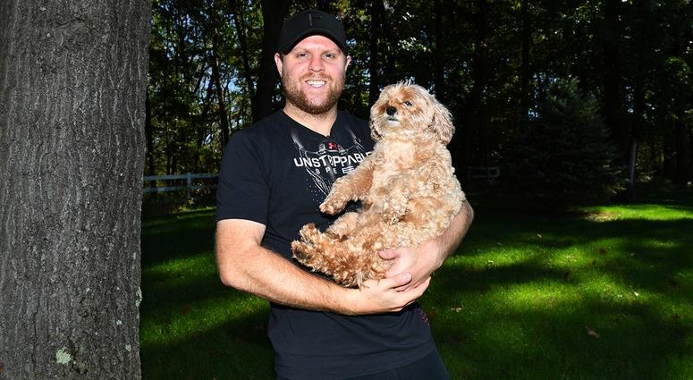Phil Kessel with a dog