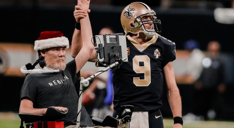 New Orleans Saints quarterback Drew Brees (9) leads the who dat chant with former player Steve Gleason New Orleans Saints quarterback Drew Brees (9) leads the who dat chant with former player Steve Gleason