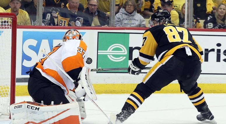 Brian Elliott stops Sidney Crosby on a breakaway. Brian Elliott stops Sidney Crosby on a breakaway.