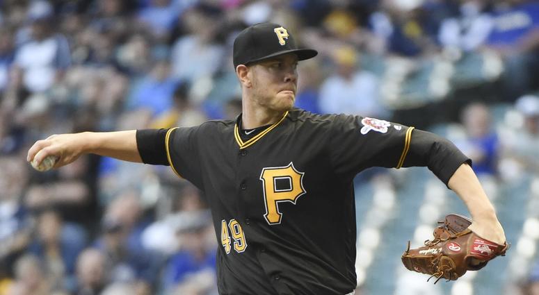 Pirates pitcher Nick Kingham throws against the Brewers Nick Kingham