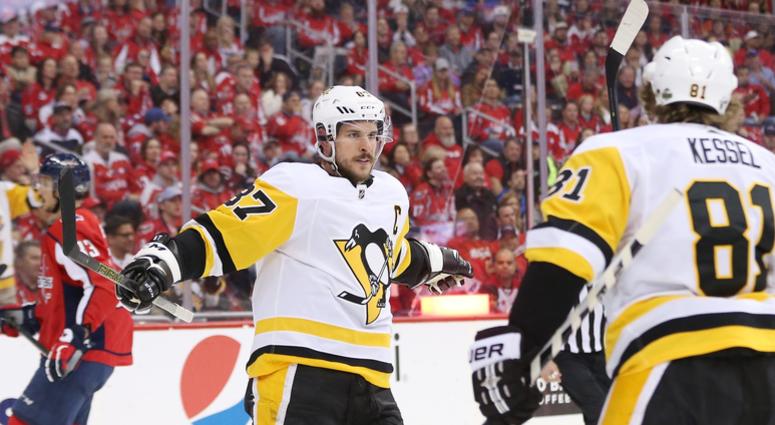 Washington, DC, USA; Pittsburgh Penguins center Sidney Crosby (87) celebrates with teammates after scoring a goal against the Washington Capitals