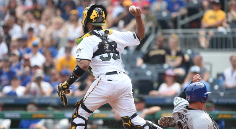Chicago Cubs first baseman Anthony Rizzo (44) slides into the leg of Pittsburgh Pirates catcher Elias Diaz (32) causing a throwing error which allowed two runs to score during the eighth inning Chicago Cubs first baseman Anthony Rizzo (44) slides into the leg of Pittsburgh Pirates catcher Elias Diaz (32) causing a throwing error which allowed two runs to score during the eighth inning