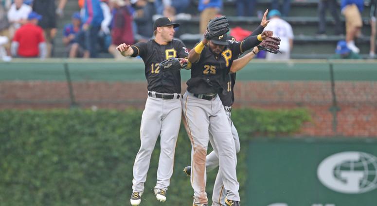 Pittsburgh Pirates left fielder Corey Dickerson (12) and right fielder Gregory Polanco (25) and center fielder Austin Meadows (17) celebrate Pirates Outfield