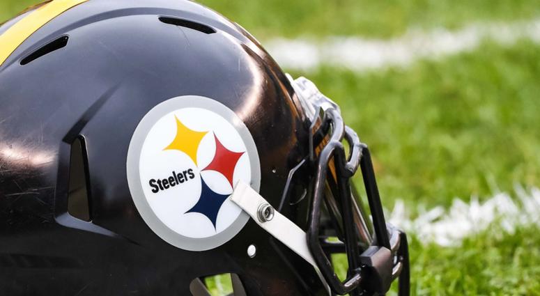 A Pittsburgh Steelers helmet sits on the field A Pittsburgh Steelers helmet sits on the field