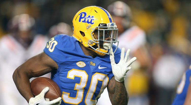 Pittsburgh Panthers running back Qadree Ollison (30) rushes for a thirty-one yard touchdown