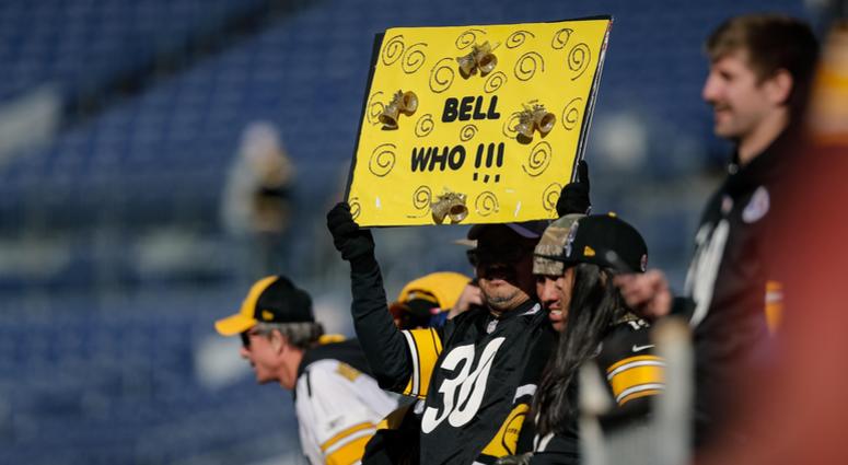 Fan holding up a sign about Le'Veon Bell