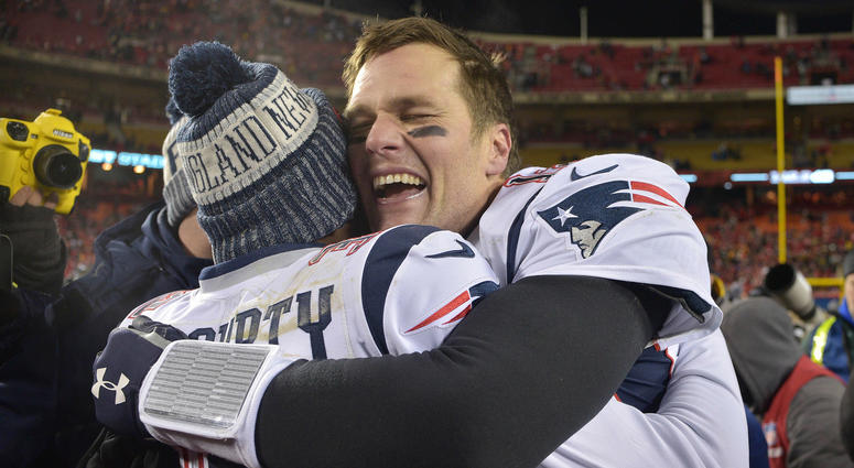 Tom Brady hugs Devin McCourty Tom Brady hugs Devin McCourty