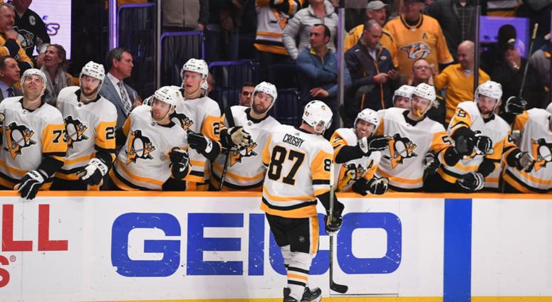 Mar 21, 2019; Nashville, TN, USA; Pittsburgh Penguins center Sidney Crosby (87) celebrates with teammates after scoring the game winner in the shootout