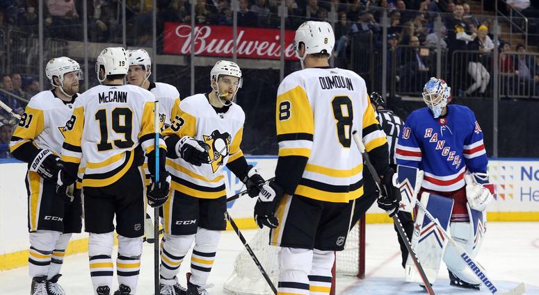 Teddy Blueger (53) celebrates a goal against New York Rangers goalie Alexandar Georgiev