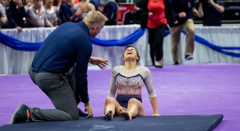 Auburn gymnast Samantha Cerio reacts to an injury during the NCAA Regionals