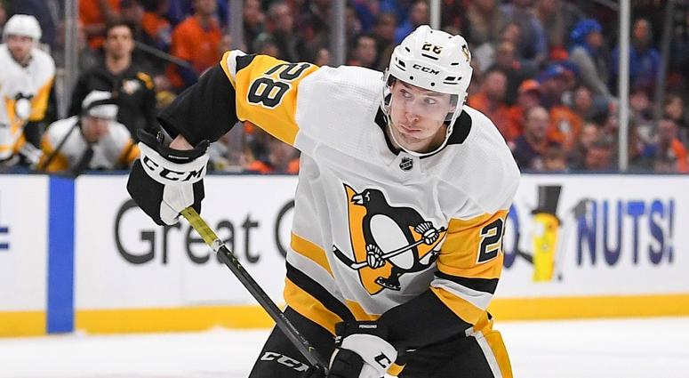 Pittsburgh Penguins defenseman Marcus Pettersson attempts a shot Pittsburgh Penguins defenseman Marcus Pettersson attempts a shot
