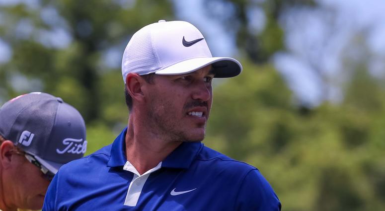 Brooks Koepka walks to the 9th hole tee box during the final round of the Zurich Classic golf tournament at TPC Louisian Brooks Koepka walks to the 9th hole tee box during the final round of the Zurich Classic golf tournament at TPC Louisian