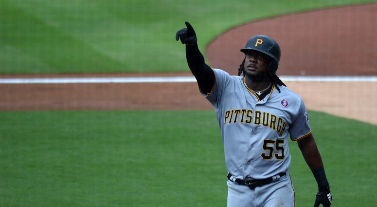 Pittsburgh Pirates first baseman Josh Bell (55) gestures after hitting a solo home run