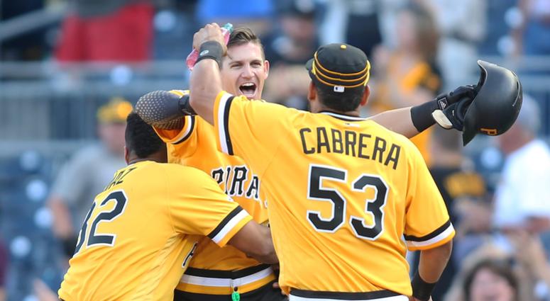 ittsburgh Pirates catcher Elias Diaz (32) and shortstop Kevin Newman (middle) and right fielder Melky Cabrera ittsburgh Pirates catcher Elias Diaz (32) and shortstop Kevin Newman (middle) and right fielder Melky Cabrera