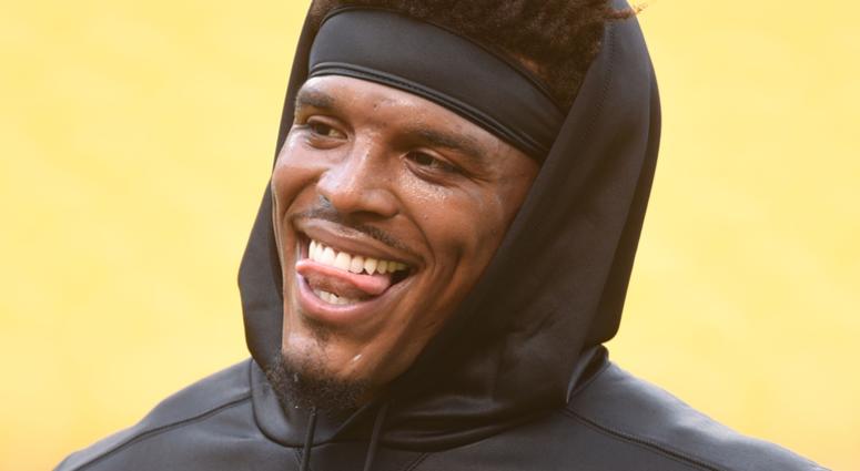 Carolina Panthers quarterback Cam Newton (1) laughs before playing the Pittsburgh Steelers at Heinz Field.