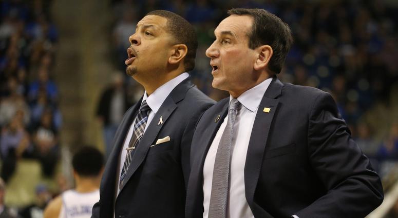 Duke Blue Devils assistant coach Jeff Capel (left) and head coach Mike Krzyzewski (right) react on the bench against the Pittsburgh Panthers during the first half at the Petersen Events Center.