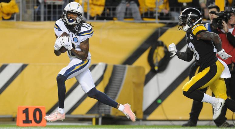 San Diego Chargers wide receiver Travis Benjamin (12) scores a first quarter touchdown by Pittsburgh Steelers cornerback Mike Hilton (28) at Heinz Field.