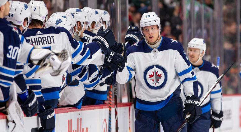 Winnipeg Jets forward Patrik Laine (29) celebrates his goal in the first period against Minnesota Wild at Xcel Energy Center.