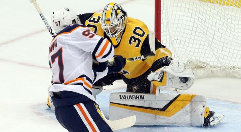 Pittsburgh Penguins goaltender Matt Murray (30) makes a save on a penalty shot by Edmonton Oilers center Connor McDavid (97) during the second period at PPG PAINTS Arena.