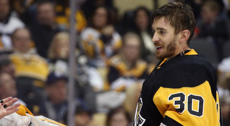 Pittsburgh Penguins goaltender Matt Murray (30) reacts after having his helmet knockoff by the Winnipeg Jets during the third period at PPG PAINTS Arena. The Penguins shutout the Jets 4-0.