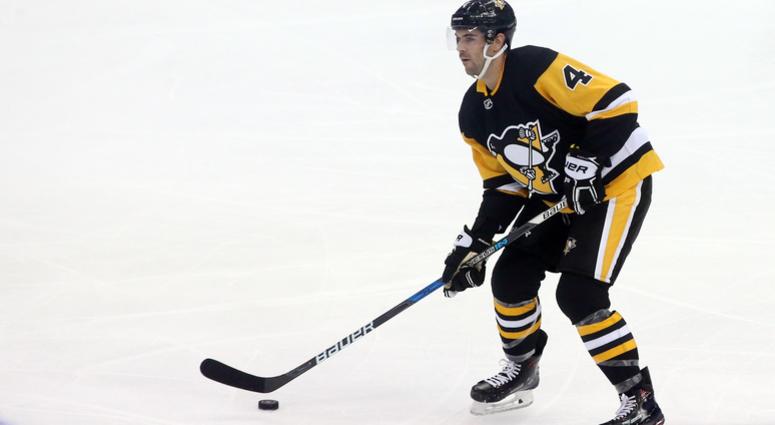 Pittsburgh Penguins defenseman Justin Schultz (4) moves the puck against the Montreal Canadiens during the second period at PPG PAINTS Arena. Montreal won 5-1.