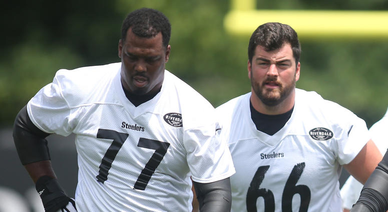 Pittsburgh Steelers offensive lineman Marcus Gilbert (77) and David DeCastro (66) and Maurkice Pouncey (53) and Ramon Foster (73) participate in drills during minicamp at UPMC Rooney Sports Complex.