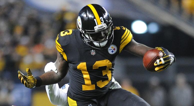 Pittsburgh Steelerswide receiver James Washington (13) is slowed down by New England Patriots cornerback Jason McCourty (30) during the third quarter at Heinz Field.