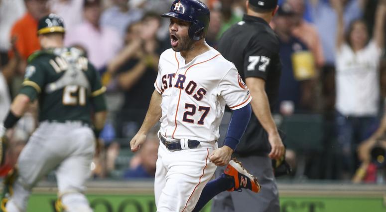 Jose Altuve scores Jose Altuve scores