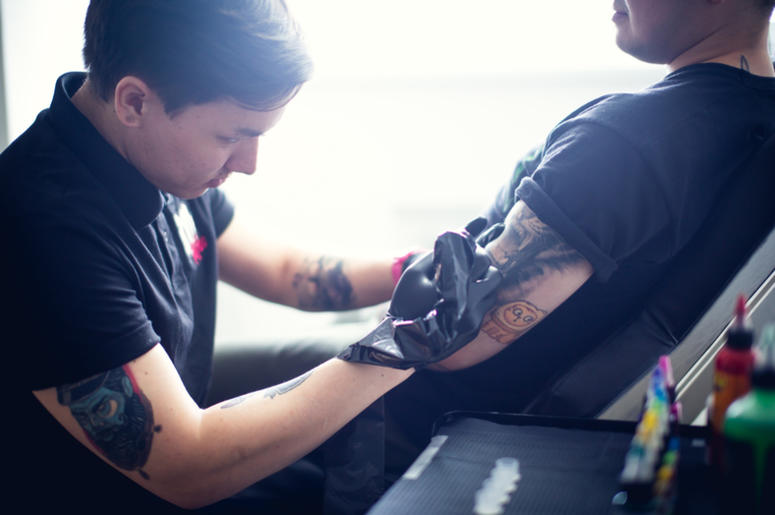 Man getting tattoo