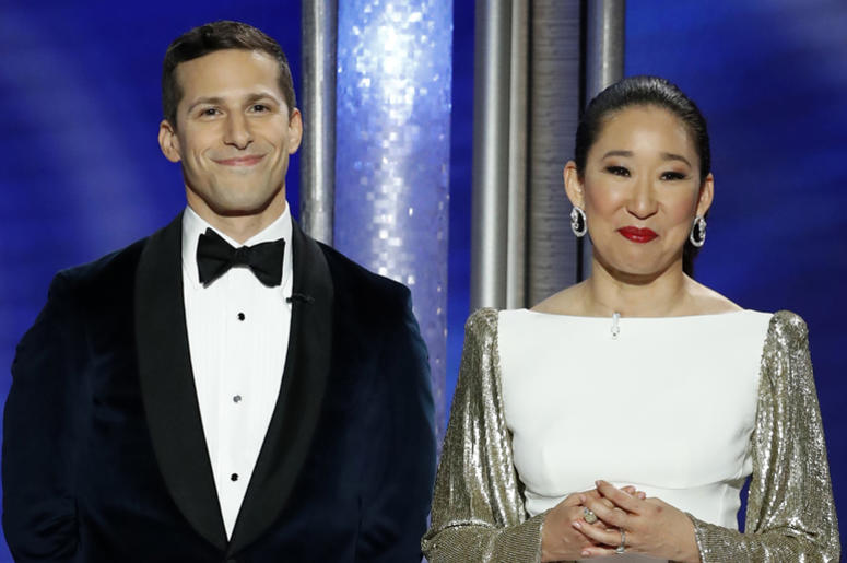 Hosts Andy Samberg and Sandra Oh at the 76th Golden Globe Awards Jan 6, 2019; Beverly Hills, CA, USA; Andy Samberg and Sandra Oh during the 76th Golden Globe Awards at the Beverly Hilton. Mandatory Credit: Paul Drinkwater/NBC via USA TODAY NETWORK