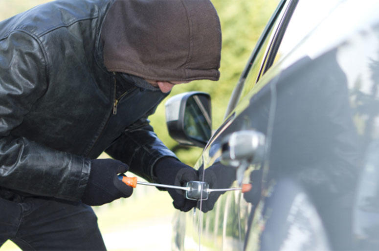 Man Breaking Into Car Man Breaking Into Car